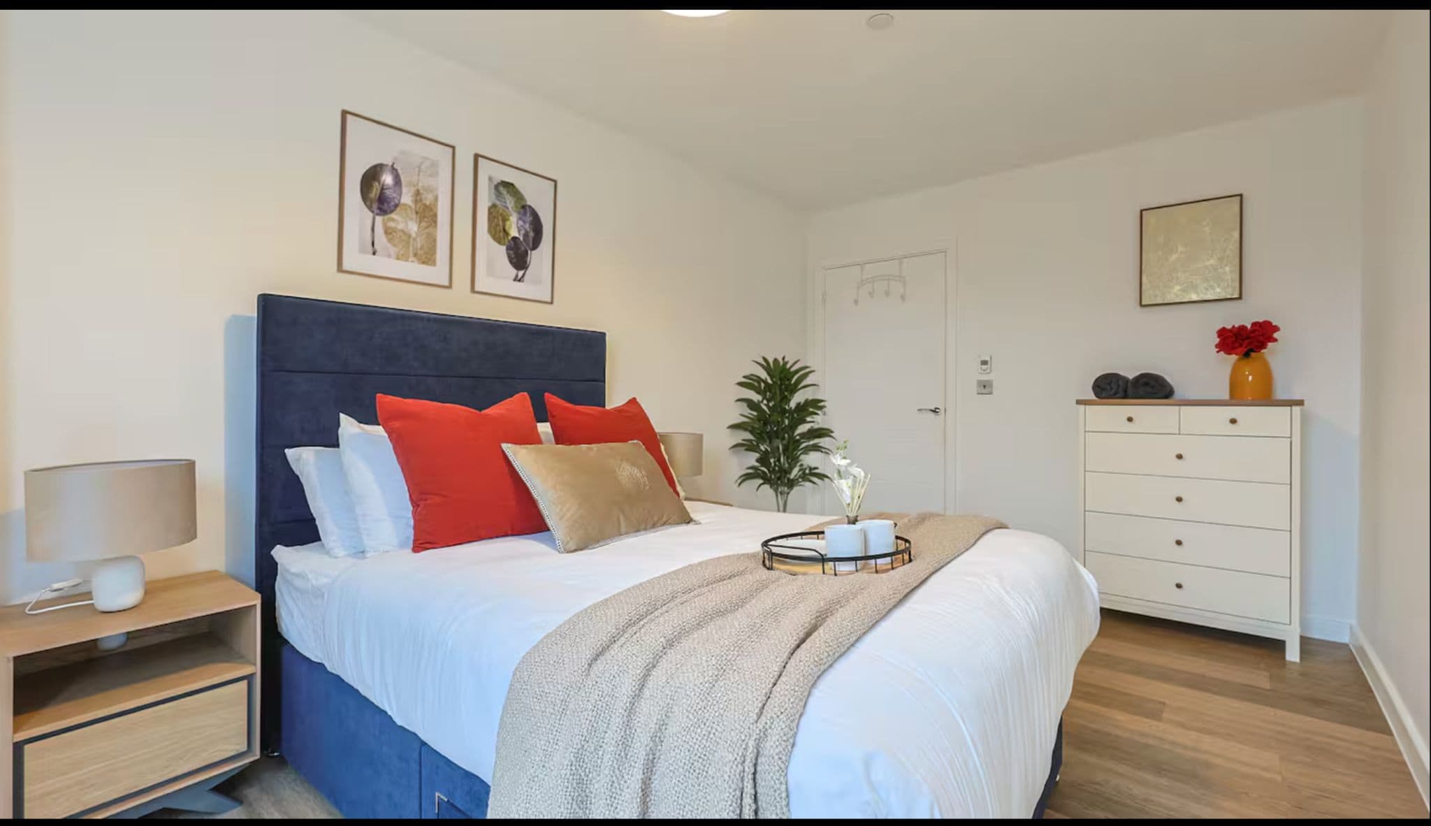 Bright, stylish bedroom with plush bedding and modern, welcoming décor